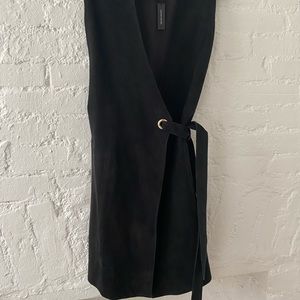 Black suede dress. it is fully adjustable with side tie to fit larger or smaller